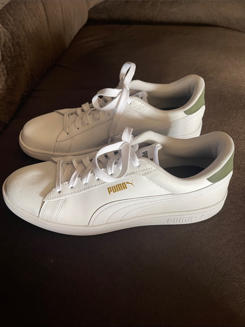 Puma White Sneakers with Olive Heel and Gold Logo
